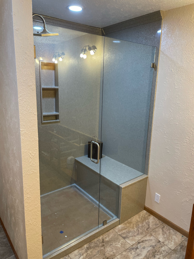 Shower with built-in bench