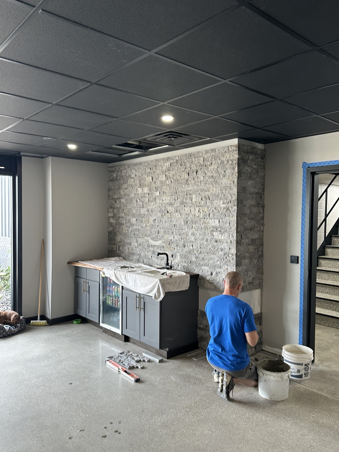 Stone feature wall in the remodeled shop